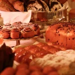 Dining options include Philosophico (Italian), The Grill (steaks), Laan Thai, Grand Café, and Rolling Stone Rooftop Bar